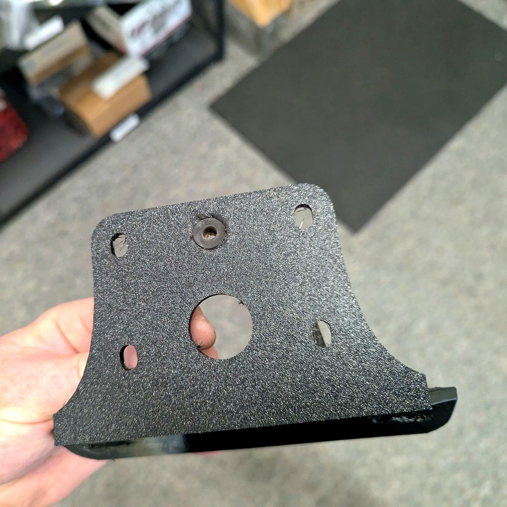 Flexi Fender Yamaha TW200 tail tidy bracket close-up showing mounting slots
