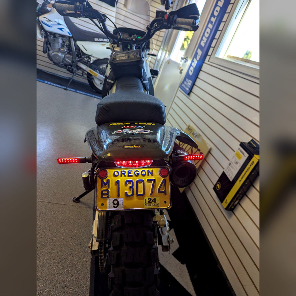 Flexi Fender tail tidy installed on a Yamaha TW200, rear view with LED tail light and signals